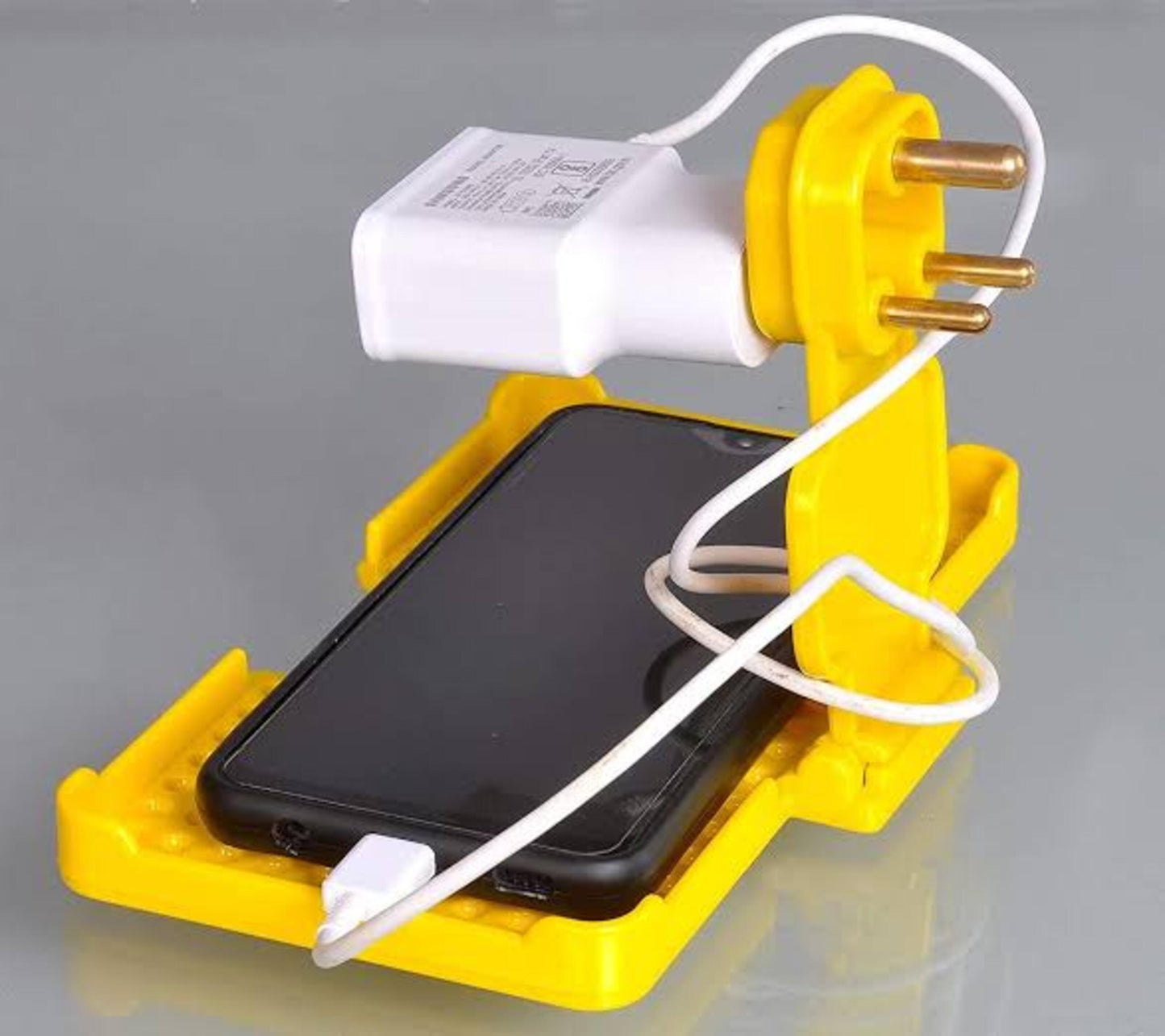 CHARGING PLUG HOLDER